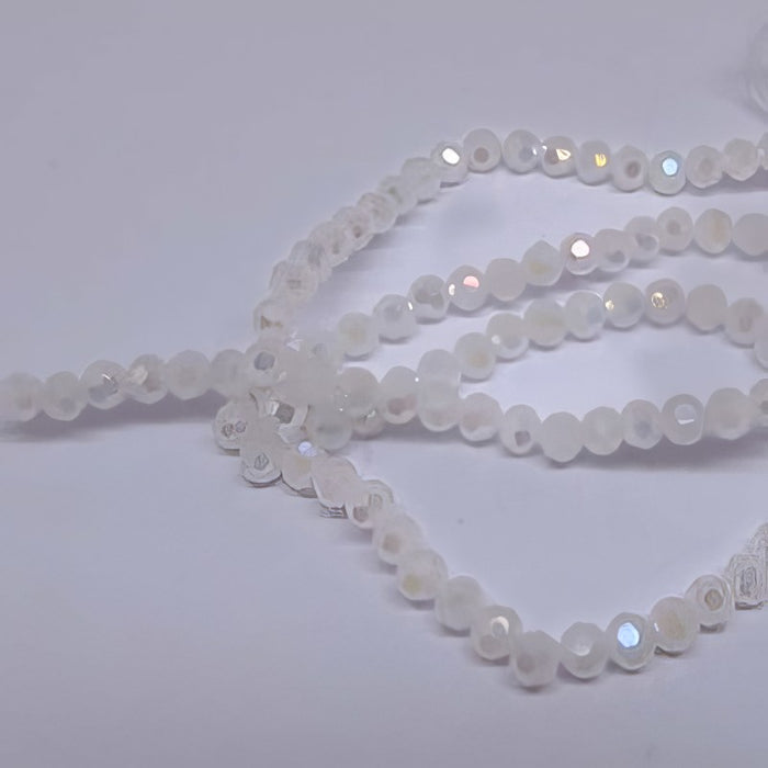 Glas rund Facetiert weiss AB 3mm 1 Strang
