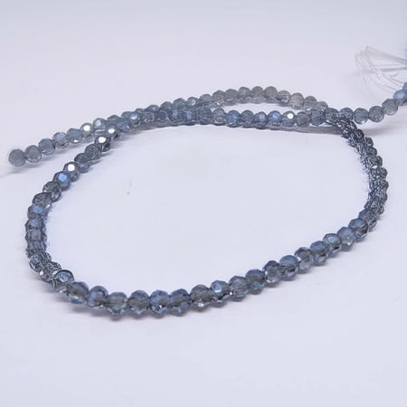 Glas rund facettiert blaugrau AB 3mm 1 Strang