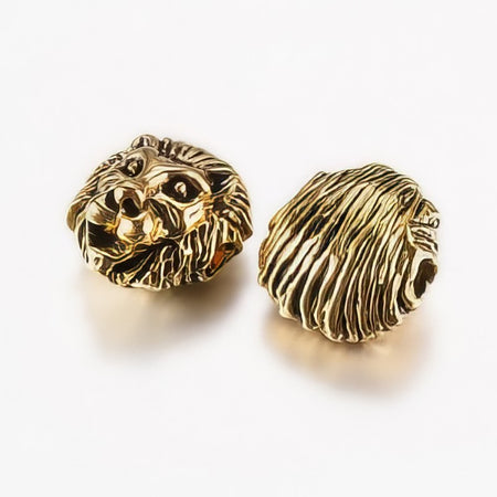 Löwenkopf 13x12x8mm goldf. L 1.5mm 1 Stück