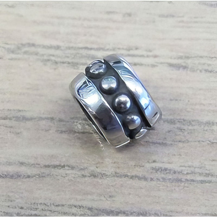 Metallperlen Edelstahl "dott" 7x5mm 1Stk