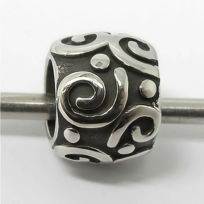 Metallperlen Edelstahl "Schnörkel" 9x7.5mm 1Stk