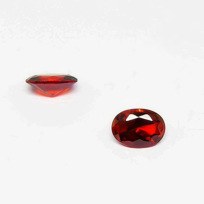 Zirkonia dunkelrot oval 7x5mm bis 650C° Farb stabiel  1 Stück