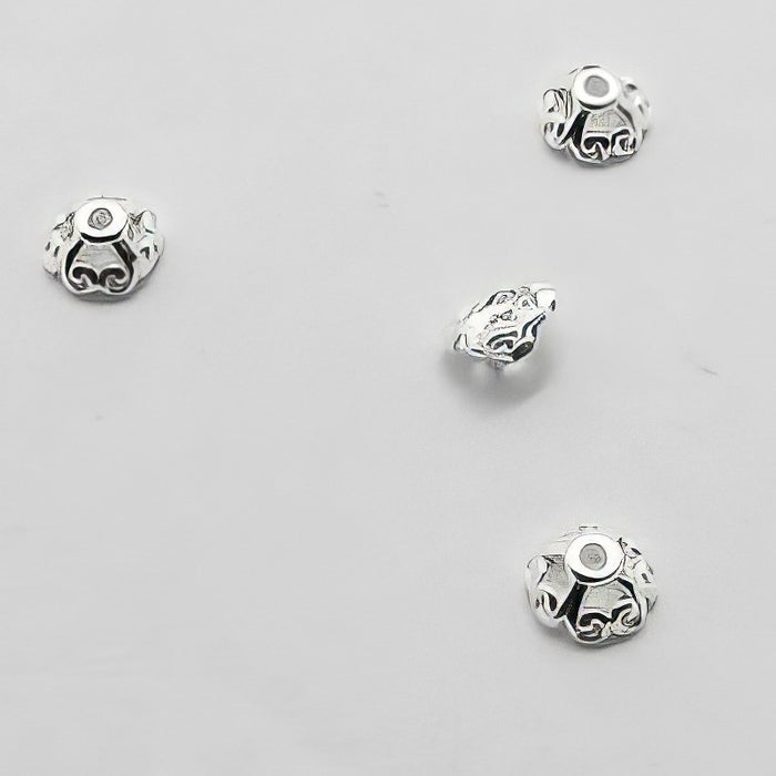 Perlenkappe Schnörkel mini 4mm 925 4 Stück