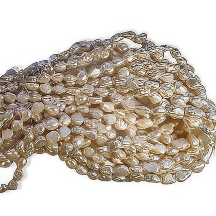 Süsswasserperle Reis cremeweiss 7x9-8x11mm 1 Strang