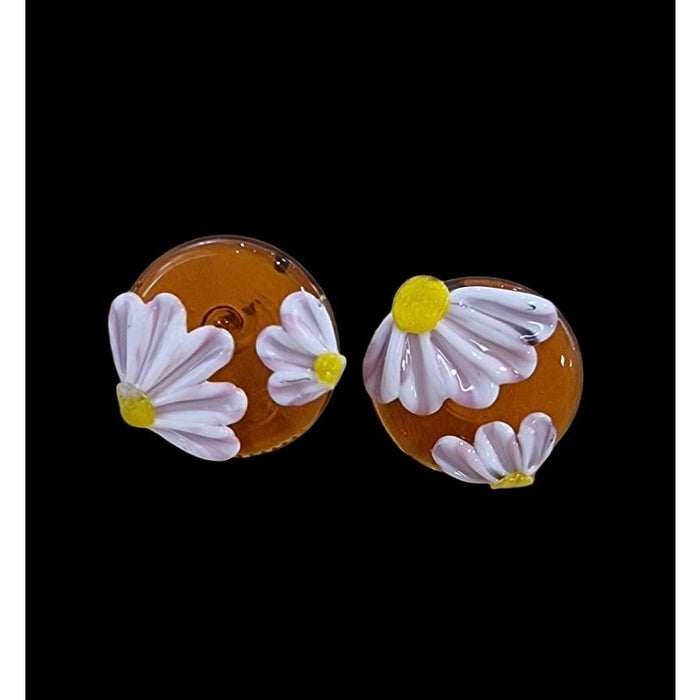 Ohrstecker Ch-Stahl Gänseblümchen Topas Swissmade
