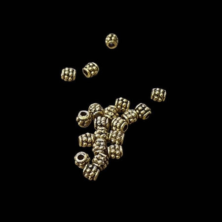 Fässliperle dott vergoldet 4x4mm 20 Stück