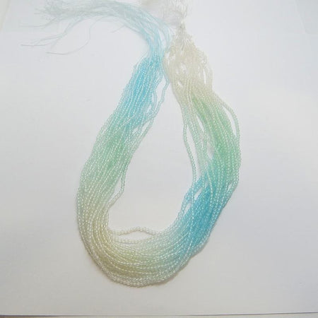 Facettierte, mehrfarbige Glasperlen blau aqua 2mm 1 Strang