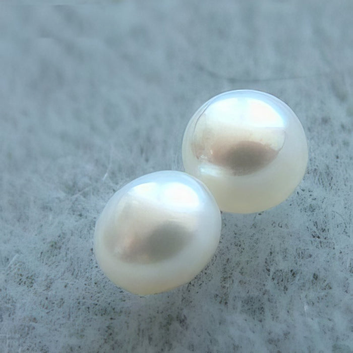 Süsswasserperlen Weiss 6.5-7mm Button peg 1 Paar