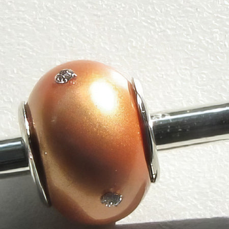 Easy style orange Muschelkern Perlen mit Swarovski Steinchen 1 Stück_1