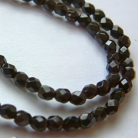 Glas rund Facettiert schwarz 3x3.5mm 1 Strang