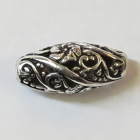 Metallperle Olive Flowery geschw. 17x8mm 1 Stk.