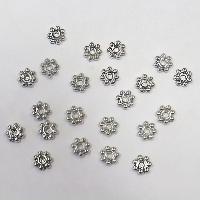 Perle Gänseblümchen mini 4mm 50 Stk.