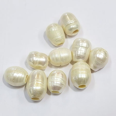 Süsswasserperle Lochgrösse 3mm creme ca. 9-12x8mm 10Stk.