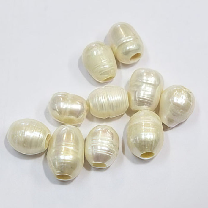 Süsswasserperle Lochgrösse 3mm creme ca. 9-12x8mm 10Stk.