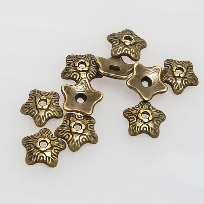 Perlenkappe Stern bronze 10mm 10 Stück