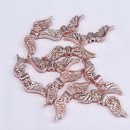 Engelsflügel Metall roségold farben 23x7mm 10 Stück