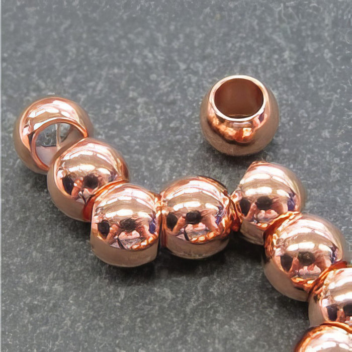 Metallperle roségoldfarben 8x6mm 1Stück