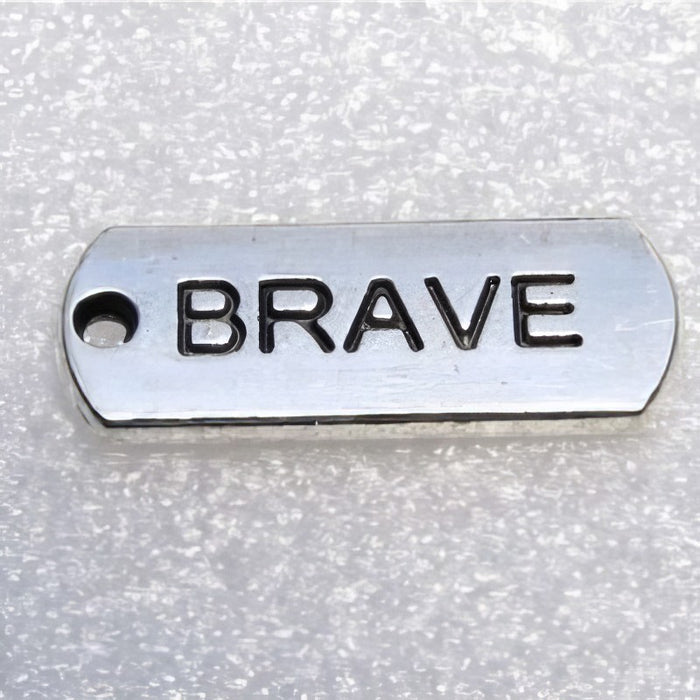 Rectangle pendant with various words 21x8mm 1 pc.