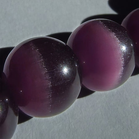 Cat's eye 4mm violett 20 Stück