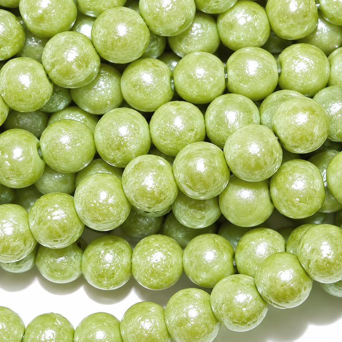 Perle en verre vert clair aspect poussière d'étoiles nacré 8 mm 20 pièces