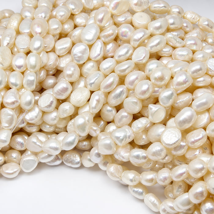 Perle d'eau douce riz crème 7x9-8x11mm 1 brin